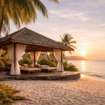Open-air beachside wellness spa Phuket at sunset, calm ocean horizon, palm trees, and a peaceful island-led wellness atmosphere
